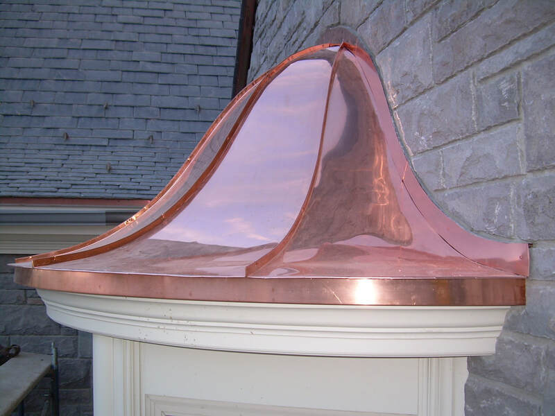 Image of Copper Standing Seam Bay Window manufactured by River Roofing-Bend.