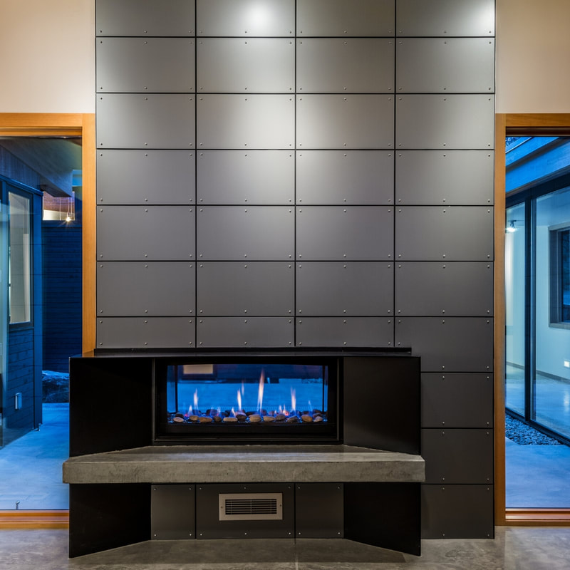 Interior image of Zinc Fireplace Surrounds manufactured by River Roofing-Bend.